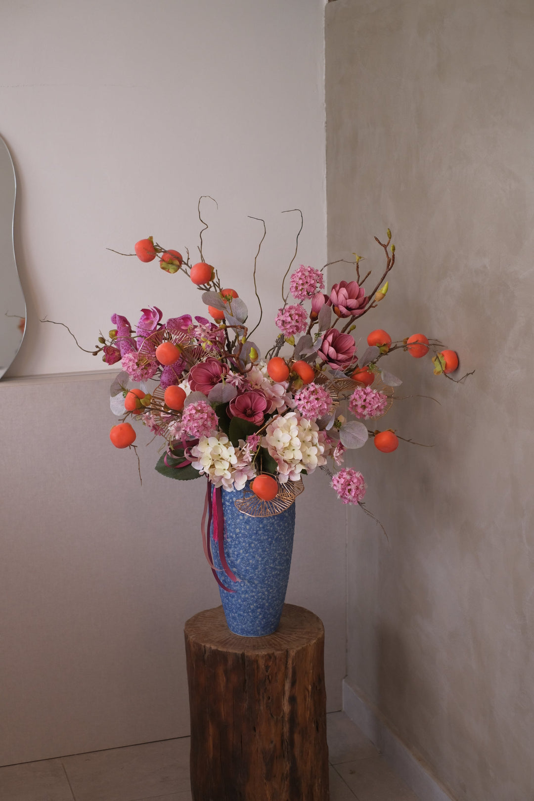 arttificial flowers for chinese new year in porcelain pots.