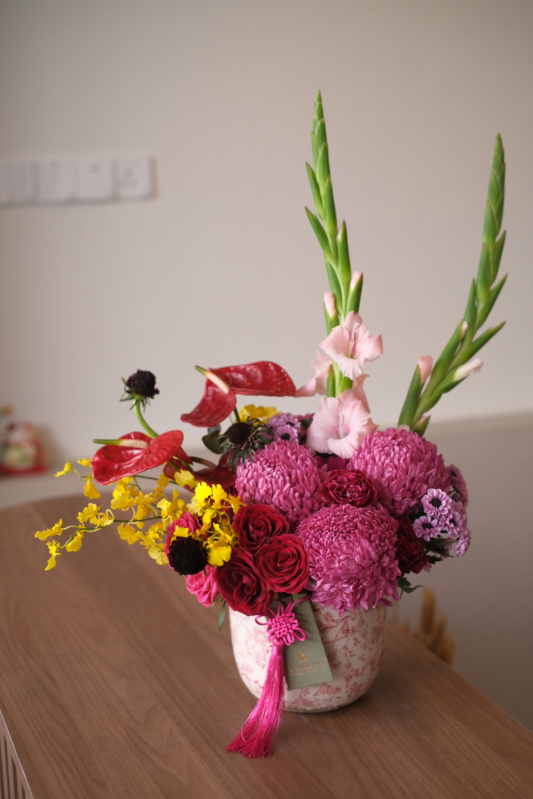 gladious and anthurium fresh flowers in ceramic pot