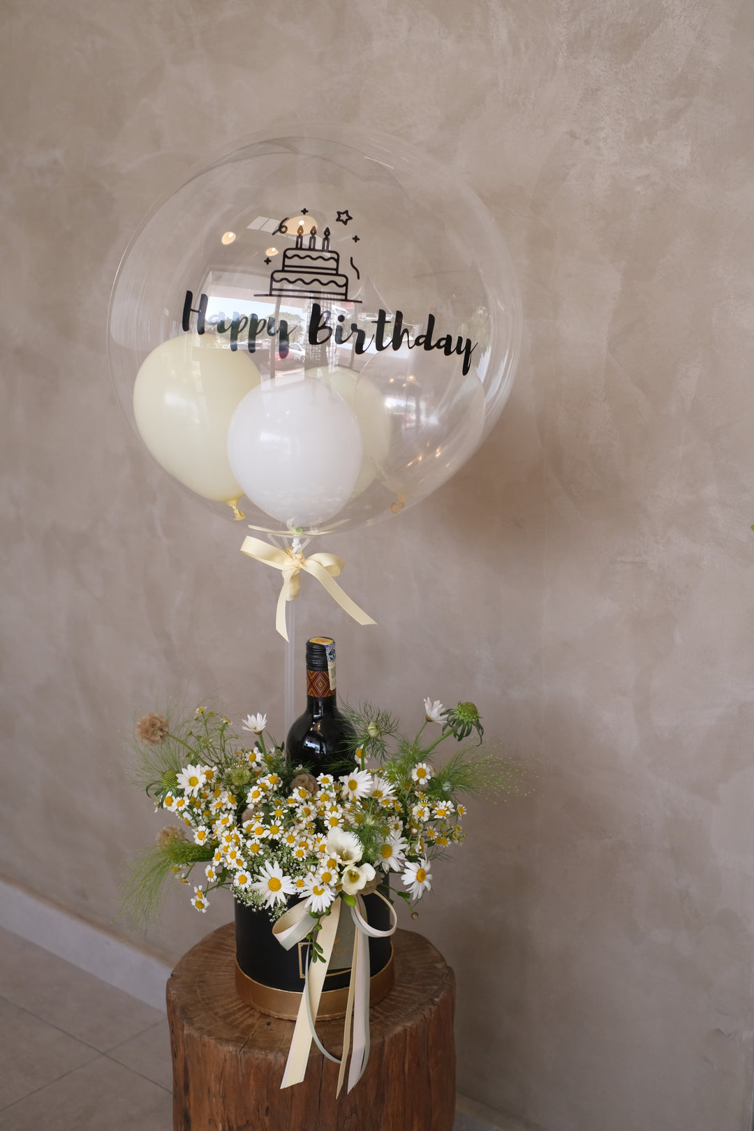 Make any occasion special with fresh baby’s breath or dainty blooms, premium Kaya Vineyard wine, and a hot air message balloon. Same-day delivery in Penang!