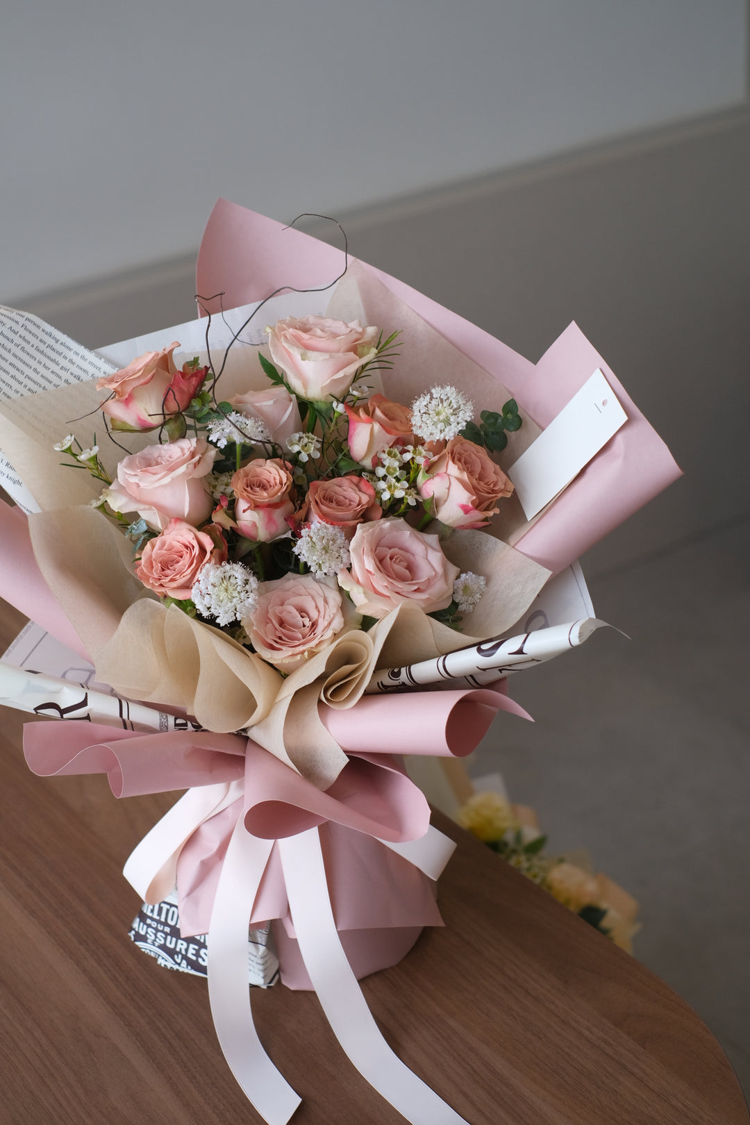 cappuccino roses bouquet of flowers delivery, bouquet of rose in with pink wraping, white pincushions florist bukit mertajam 