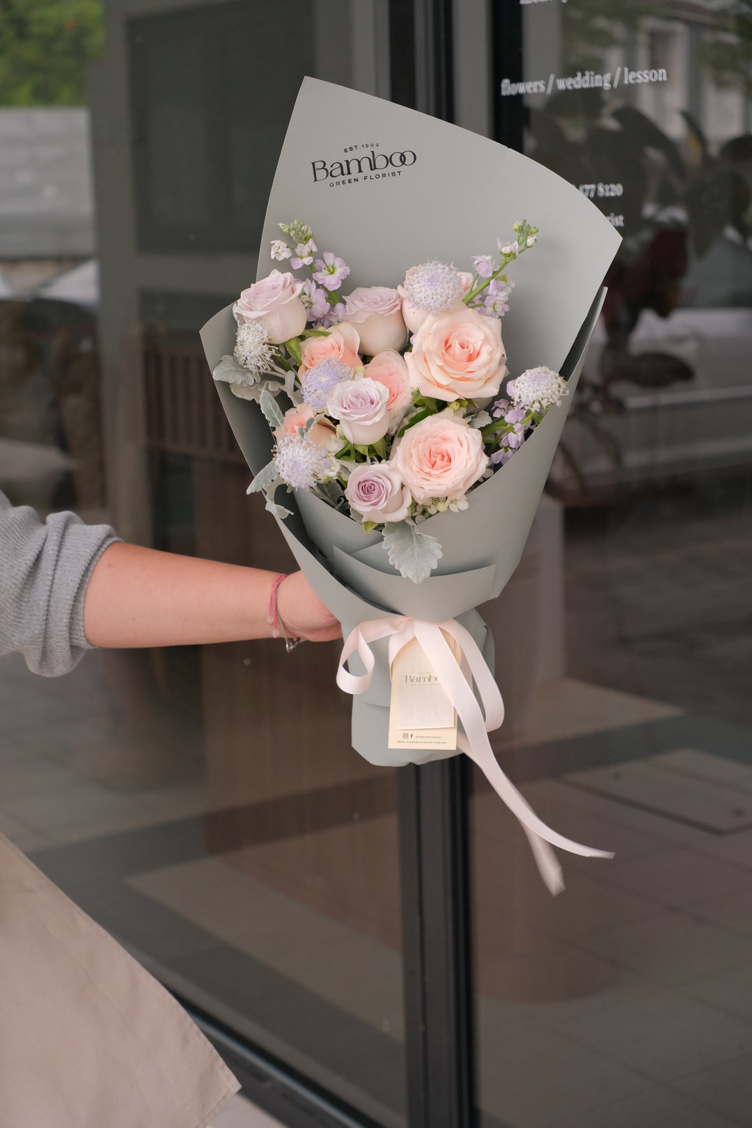 Pink and purple roses bouquet for 七夕 in sculpted grey wrap