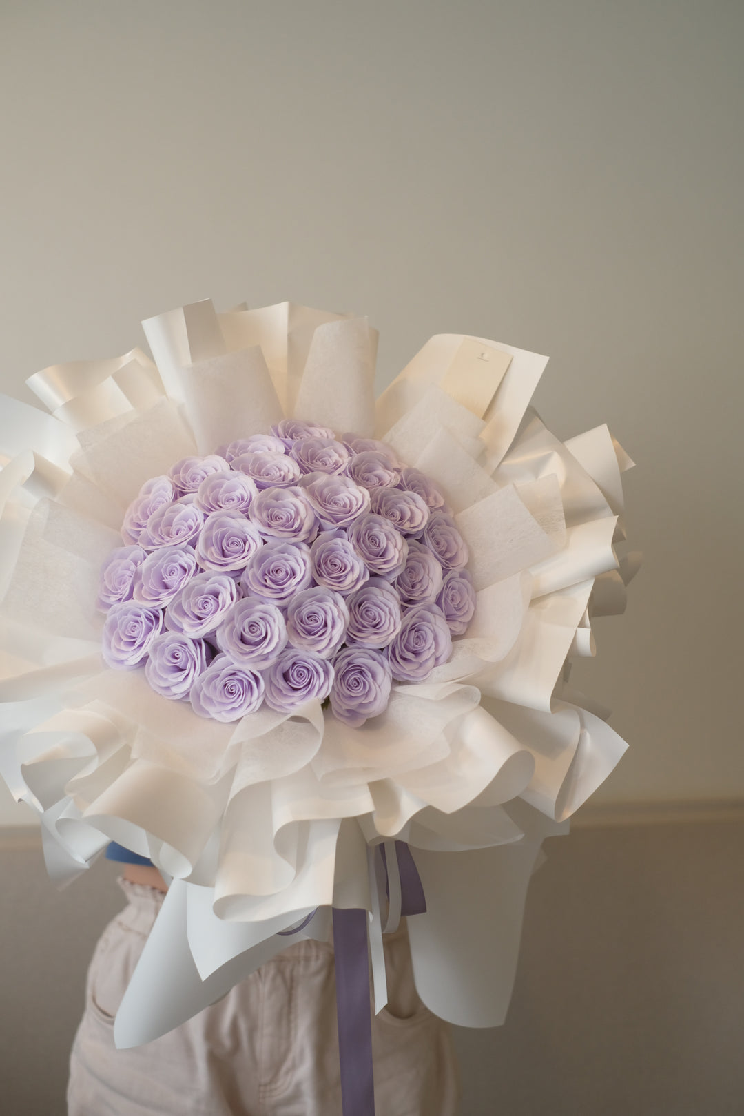 Delicate 25 stalks of light purple soap roses, a perfect gift for any occasion. Order online from Bamboo Green Florist, Penang. Same-day delivery available!