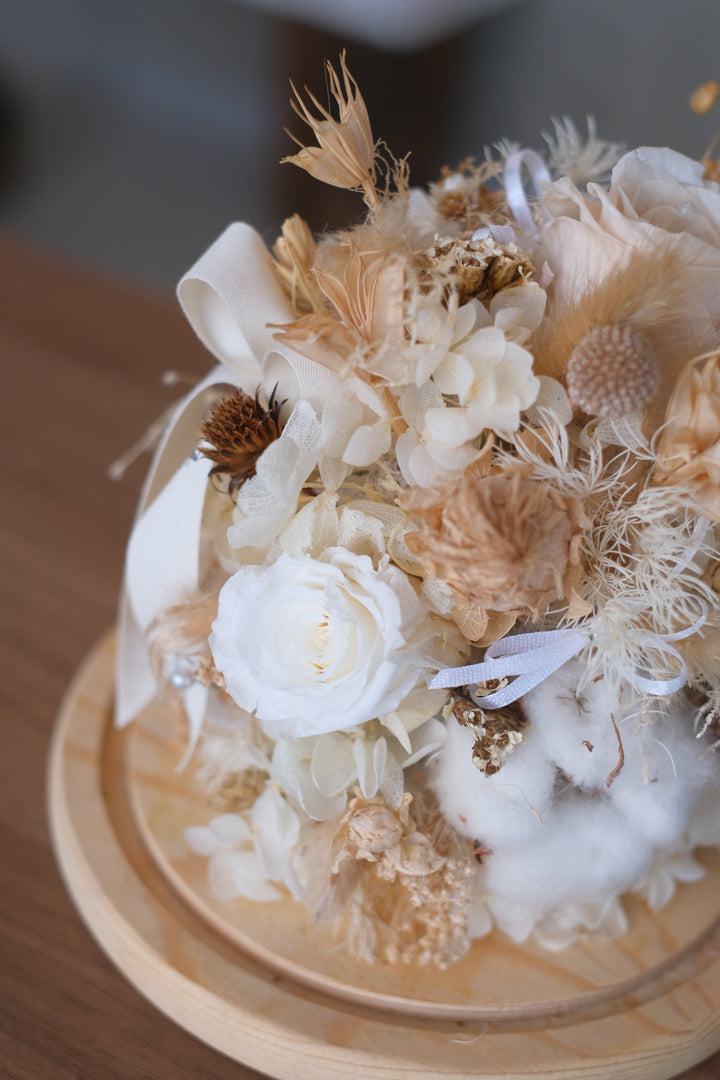 Featuring preserved roses, hydrangeas, craspedia, and bunny tails in a bell jar. Penang florist, Order online, deliver same day, preserved flowers.