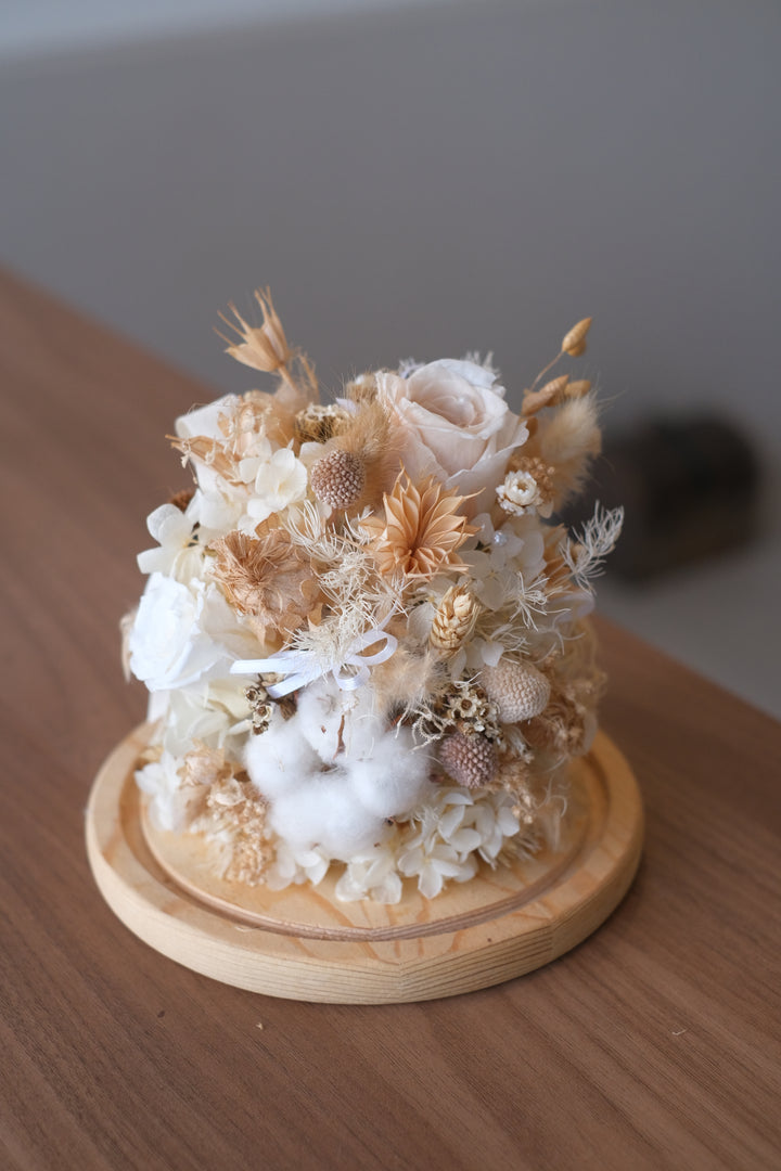Featuring preserved roses, hydrangeas, craspedia, and bunny tails in a bell jar. Penang florist, Order online, deliver same day, preserved flowers.