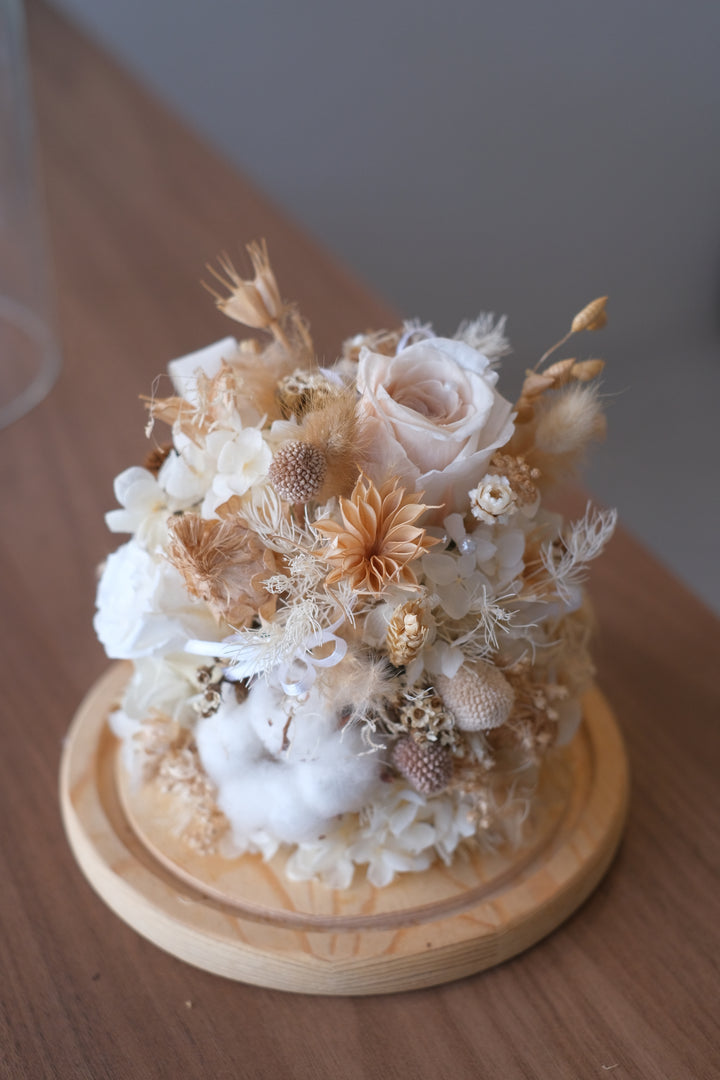 Featuring preserved roses, hydrangeas, craspedia, and bunny tails in a bell jar. Penang florist, Order online, deliver same day, preserved flowers.