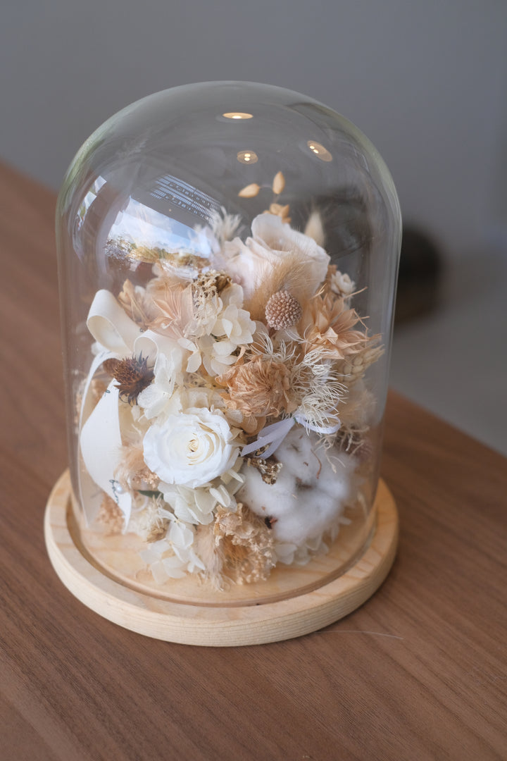 Featuring preserved roses, hydrangeas, craspedia, and bunny tails in a bell jar. Penang florist, Order online, deliver same day, preserved flowers.