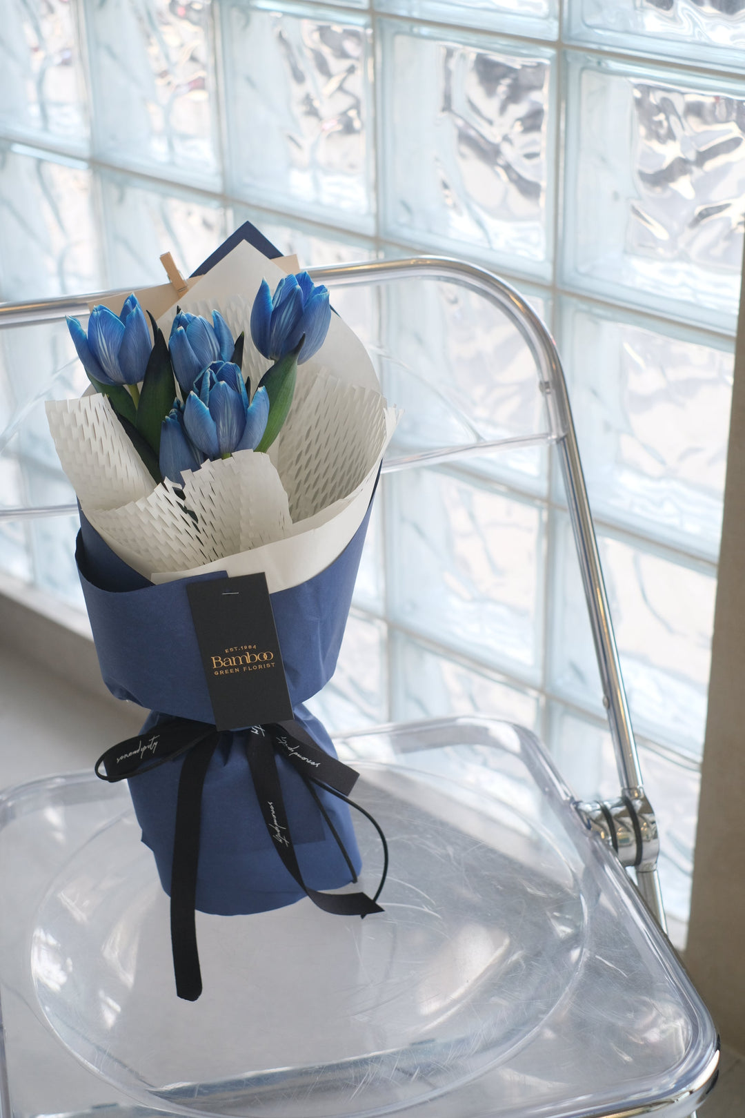 blue dyed tulips for a unique and striking floral arrangement. Order online from Bamboo Green Florist, your trusted Penang florist with delivery.