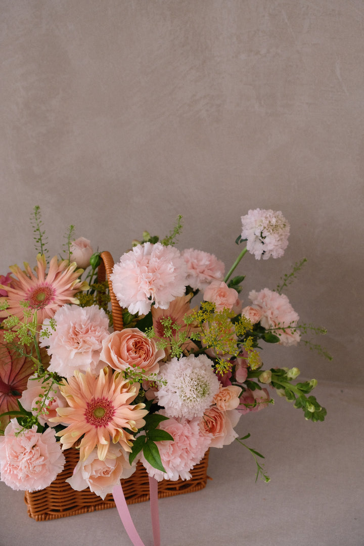 Bamboo Green Florist’s Savonade Mother’s Day gift with pink, apricot, and cream pastel flowers, available in bouquet or basket