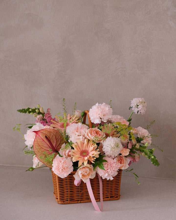 Savonade flower basket arrangement with pastel pink carnations, apricots, and cream blooms for Mum, Grandma, Auntie – Penang delivery