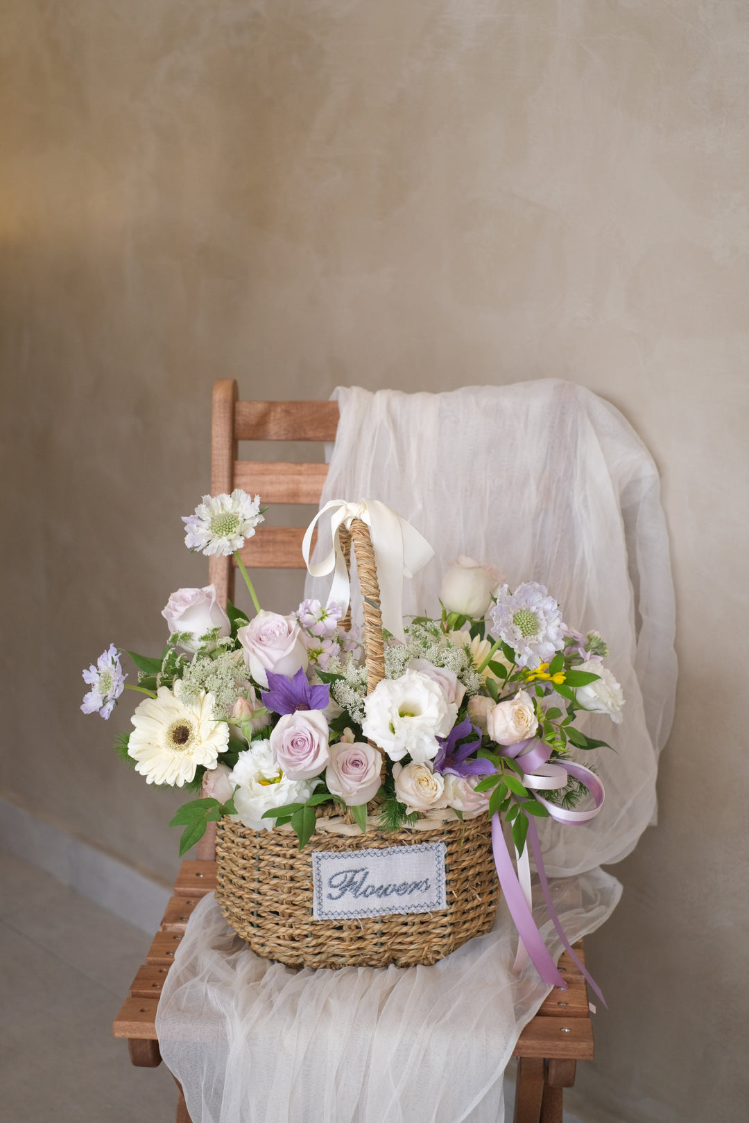 Graceful floral arrangement inspired by a ballerina, blending premium florals and pastel hues for a perfect new baby gift. Same-day delivery in Penang.