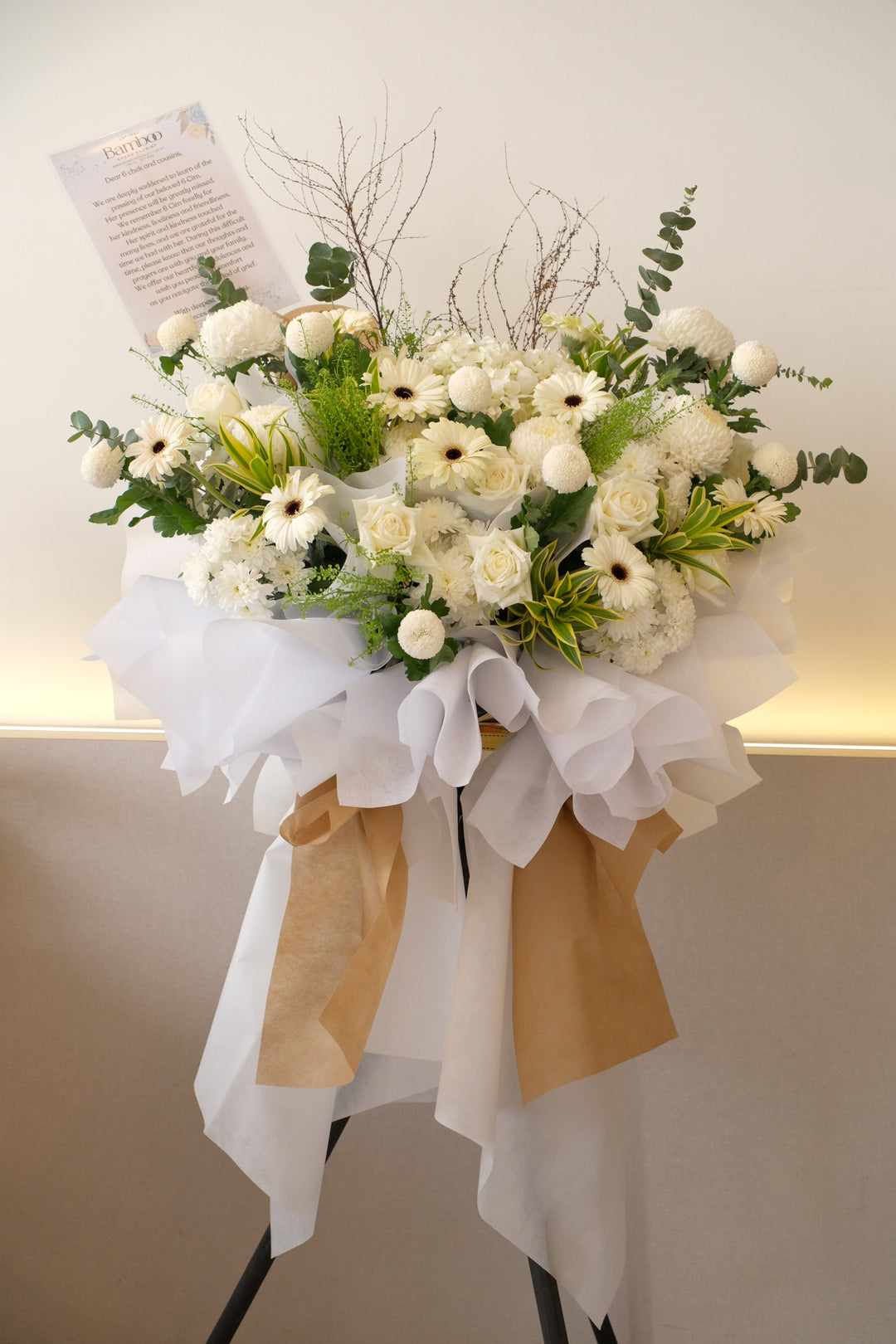This condolence flowers stand is a beautiful mix of flowers that conveys sweet memories. For same day condolences flowers delivery in Penang.