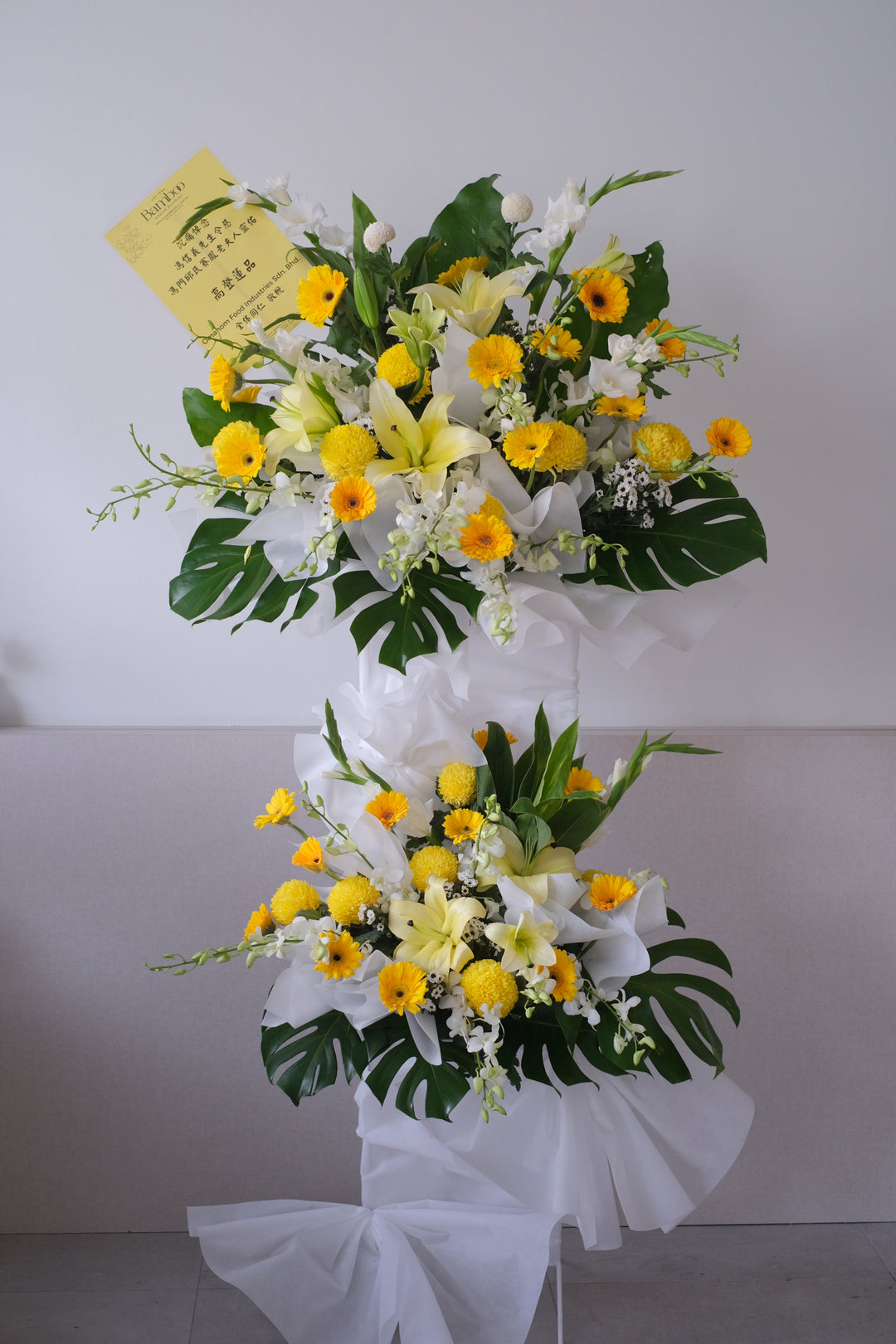  "Same-day condolences flowers delivery in Penang - A serene arrangement of white hydrangeas, gerberas, roses, fillers, and greens, expressing love and remembrance during a difficult time."