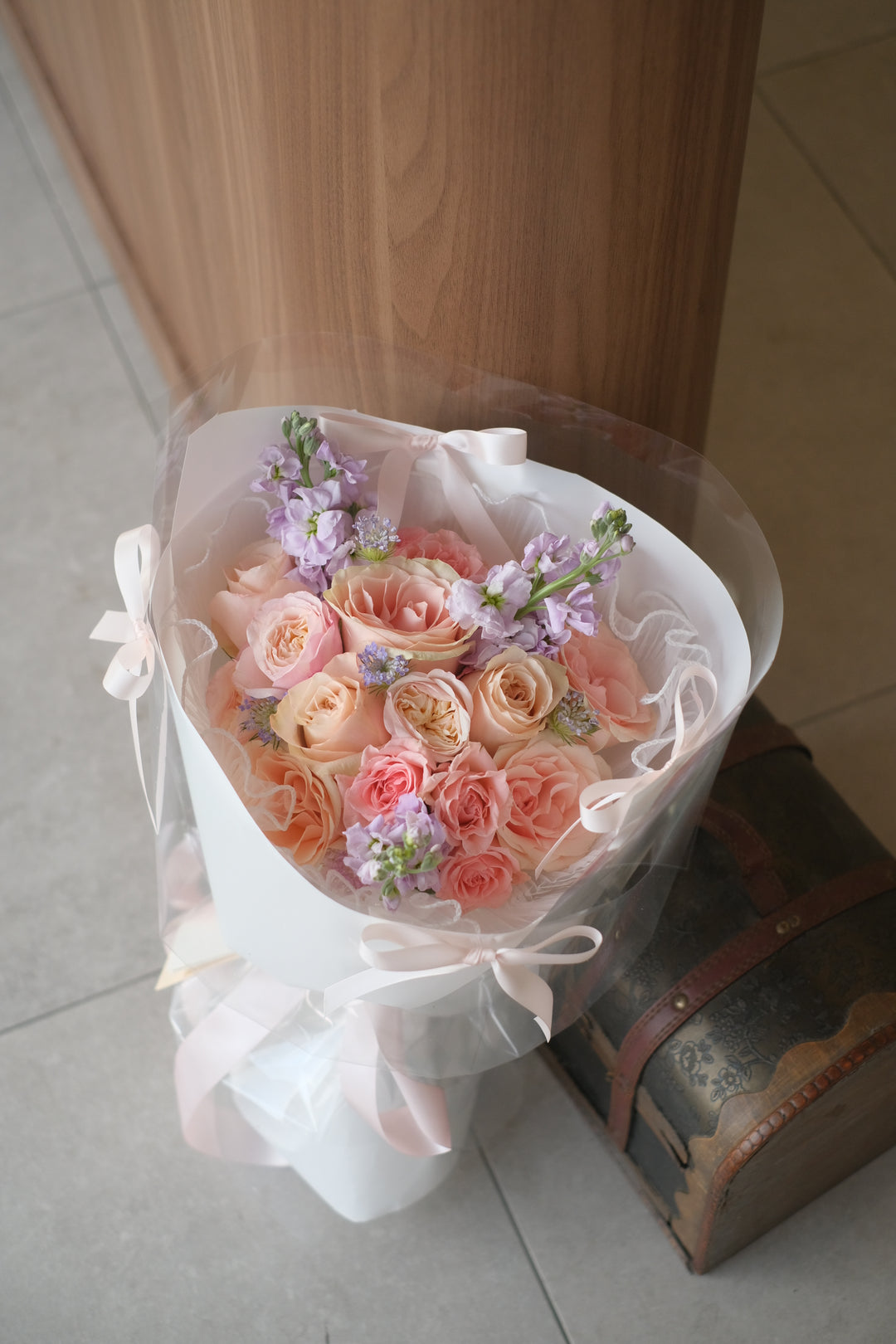 Elegant bouquet of mixed pink roses and light purple Matthiolas, styled with ballet core aesthetics. Order online from Bamboo Green Florist, your trusted Penang florist with delivery.