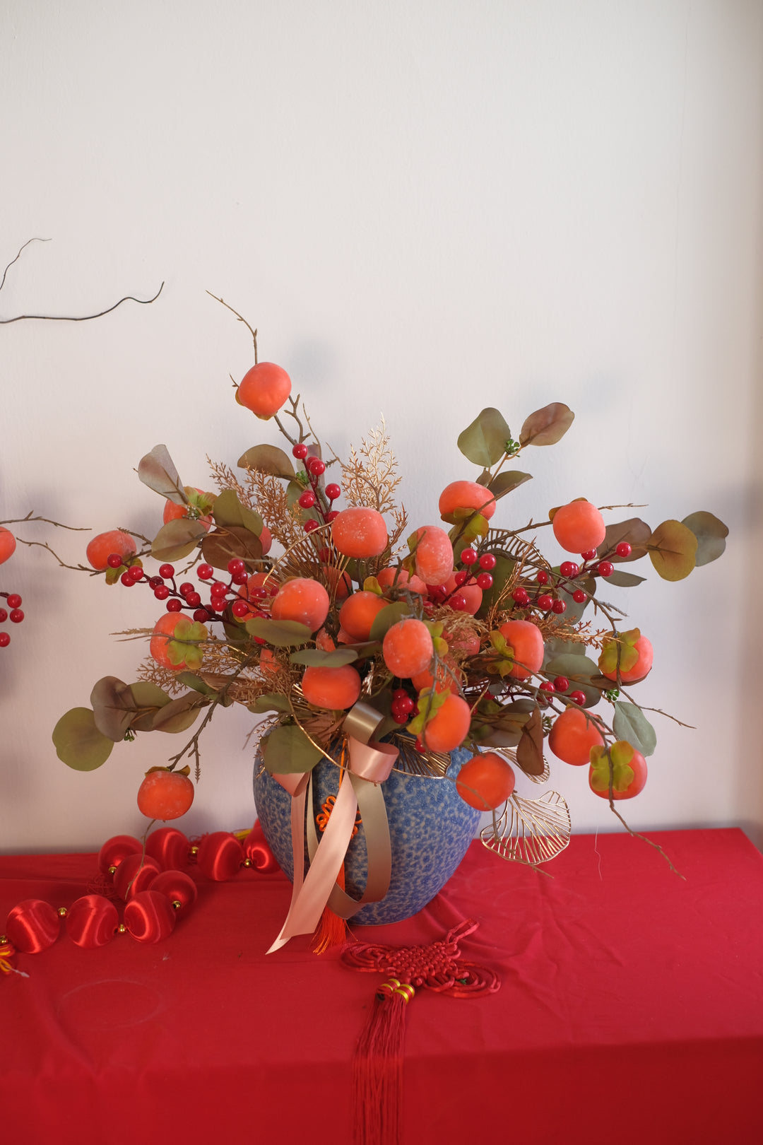 persimmons cny flowers in porcelain pot