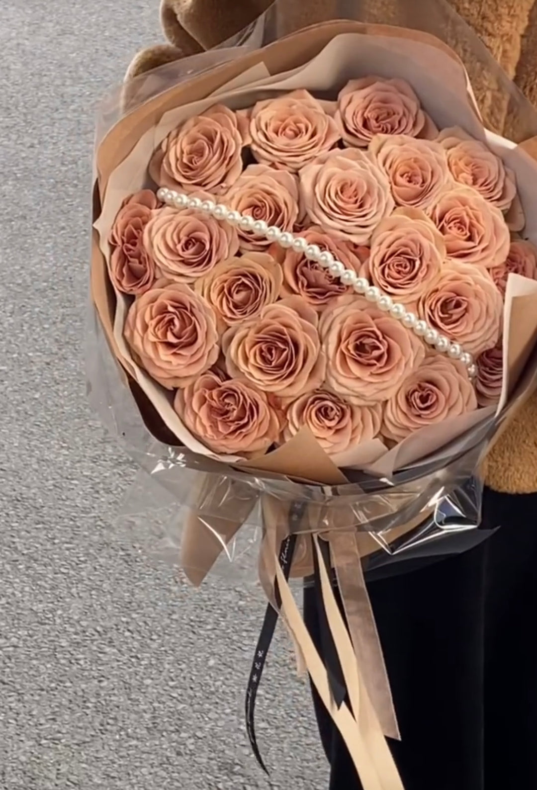 Coffee-colored roses arranged in a round Russian wrap, offering a warm and sophisticated floral design. Premium roses, elegant bouquet, luxury floral arrangement, Penang florist.