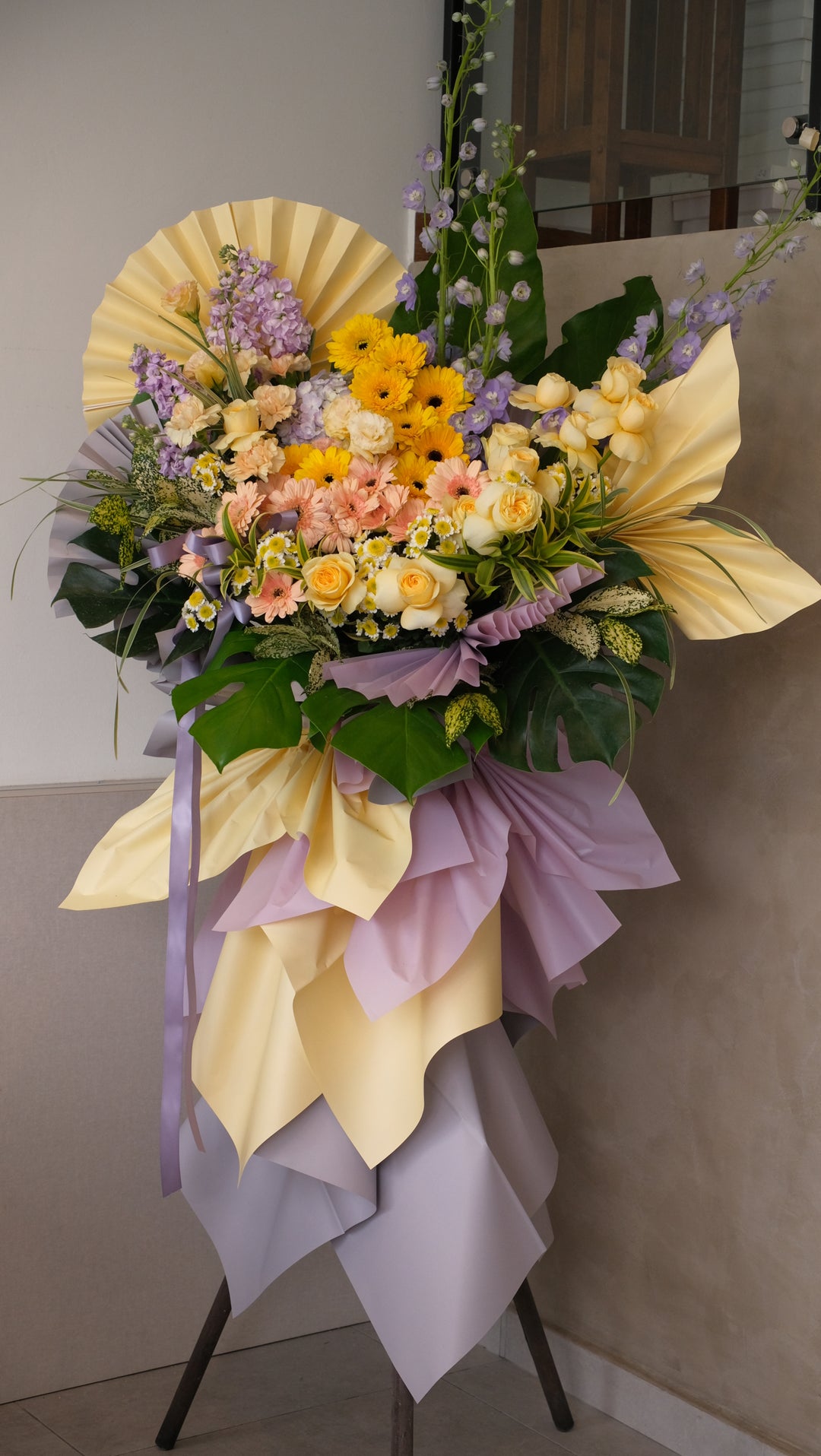 grand opening stand with fresh flowers yellow and purple lilac colour flowers found in Bamboo Green Florist in Penang Bukit Mertajam. Preorder 3 days at least