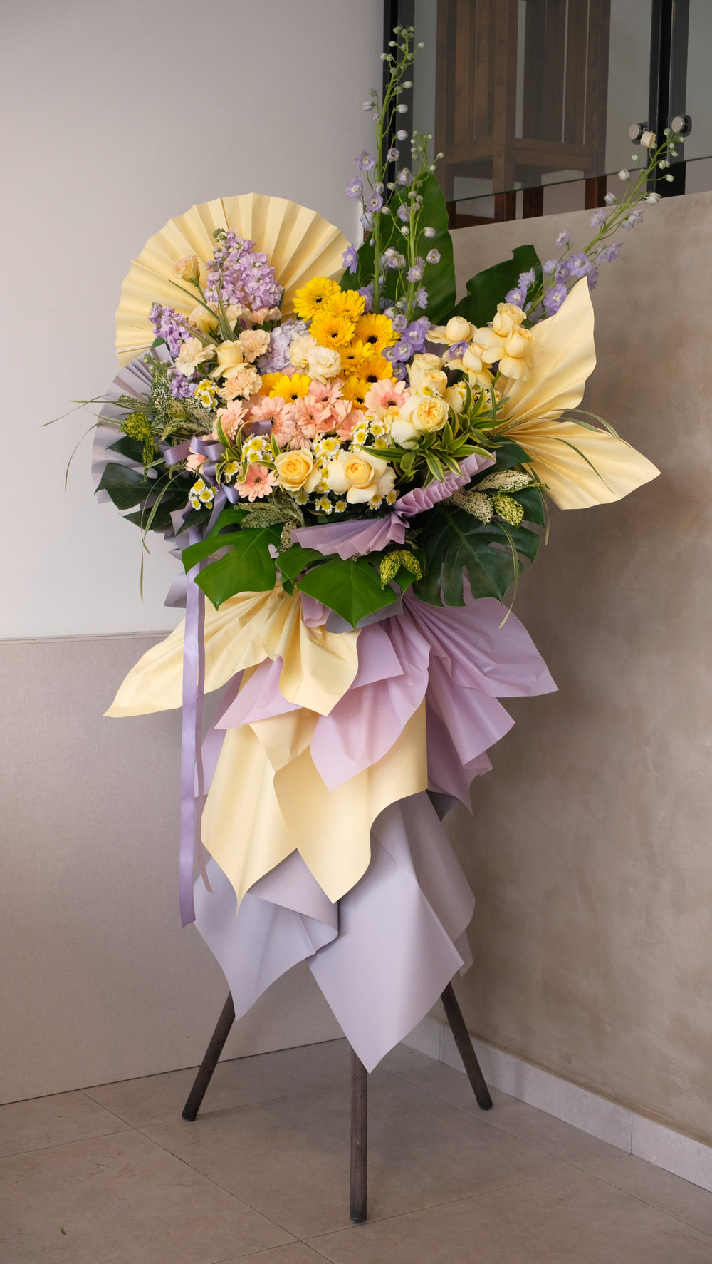 grand opening stand with fresh flowers yellow and purple lilac colour flowers found in Bamboo Green Florist in Penang Bukit Mertajam. Preorder 3 days at least