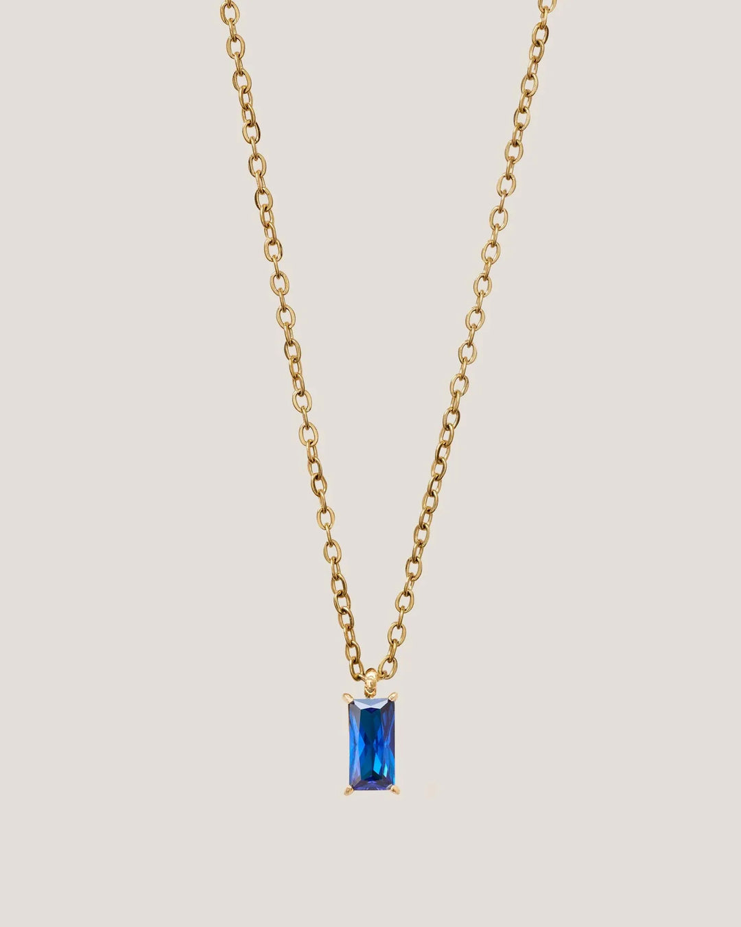 GUNG | Verity Blue Sapphire Pendant Gold Necklace by Bamboo Green Florist – a luxurious gift with additional options. Perfect for celebrations in Penang. Order now!