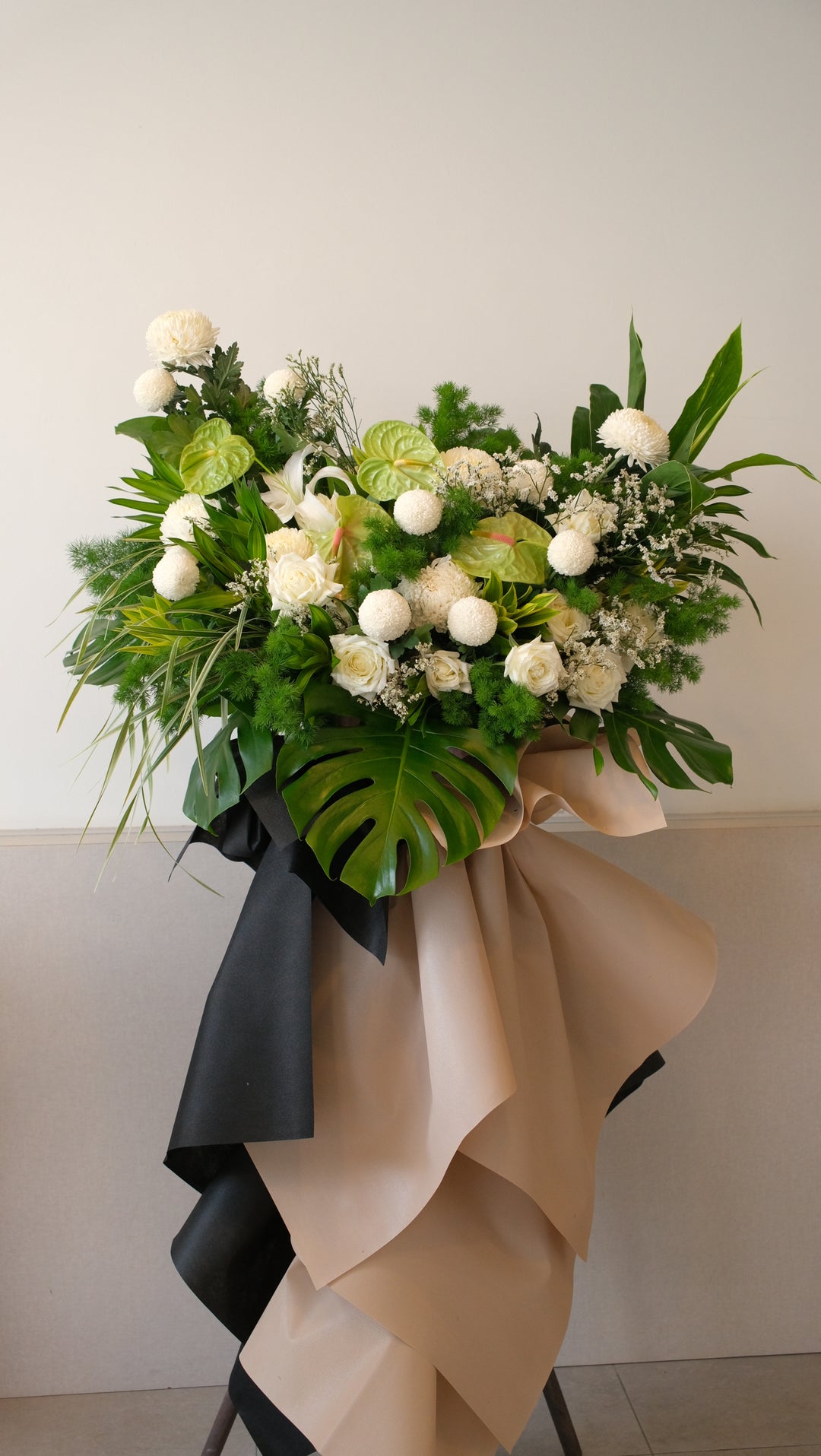 green and white soothing condolences flowers for penang delivery