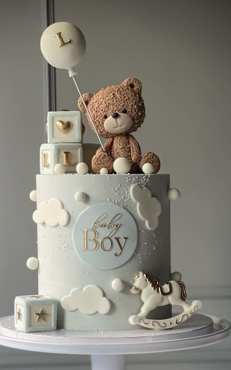 Celebrate your little prince with this pastel blue baby shower cake, adorned with elegant gold accents. Same-day delivery in Penang from Bamboo Green Florist.