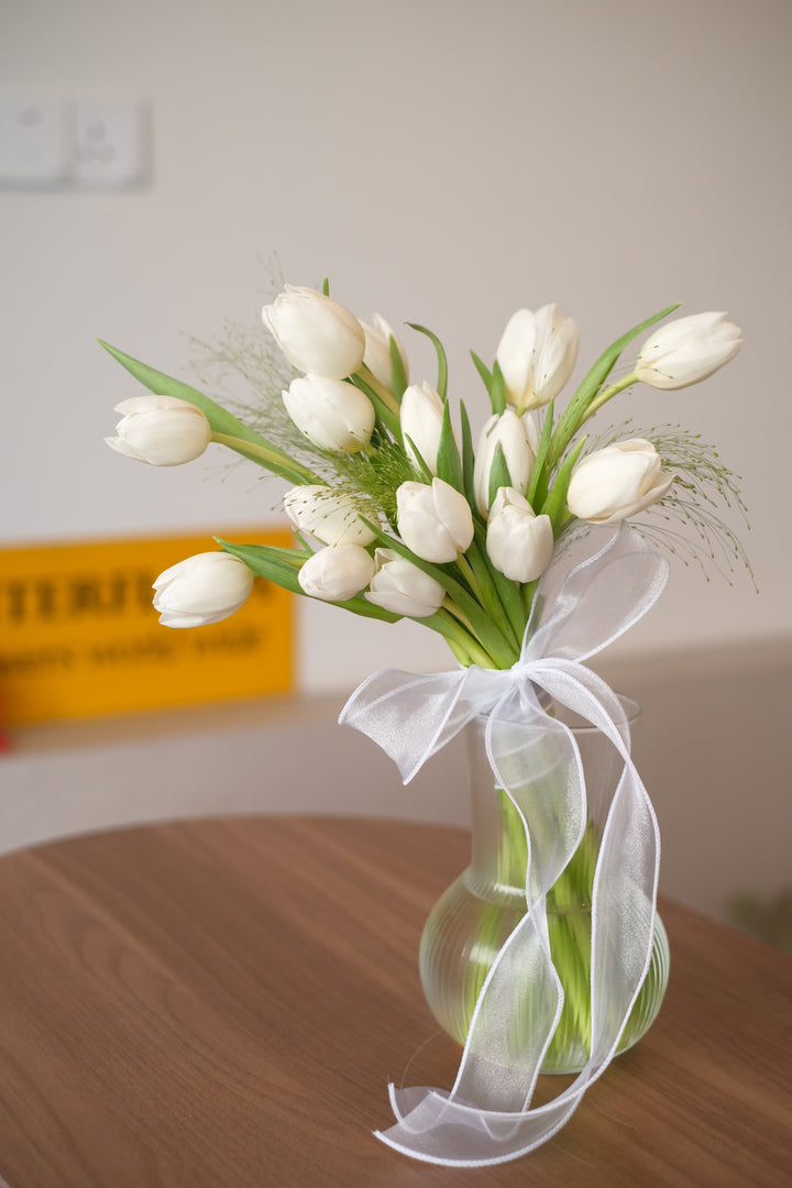 Elegant white tulips bridal bouquet from Bamboo Green Florist. Order online for same-day delivery in Penang. Perfect for a classic wedding look!