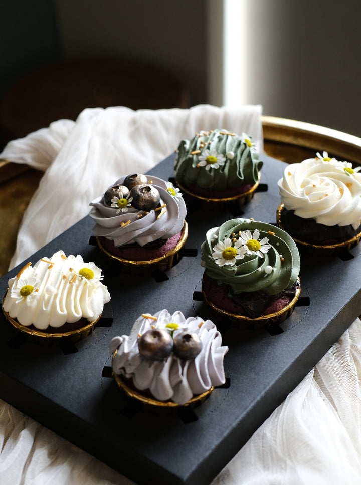 Berries velvet cupcakes, beautifully swirled with artisan fresh creams, garnished with gold dusted blueberries and fresh chamomile. Penang Cake Delivery, Penang Cake Delivery.  NOTE:  Strictly 3 days order in advance, deliveries limited to Island & Mainland Penang, Sungai Petani, Nibong Tebal, Jawi & Kulim.   For urgent orders kindly contact customer care for further assistance.