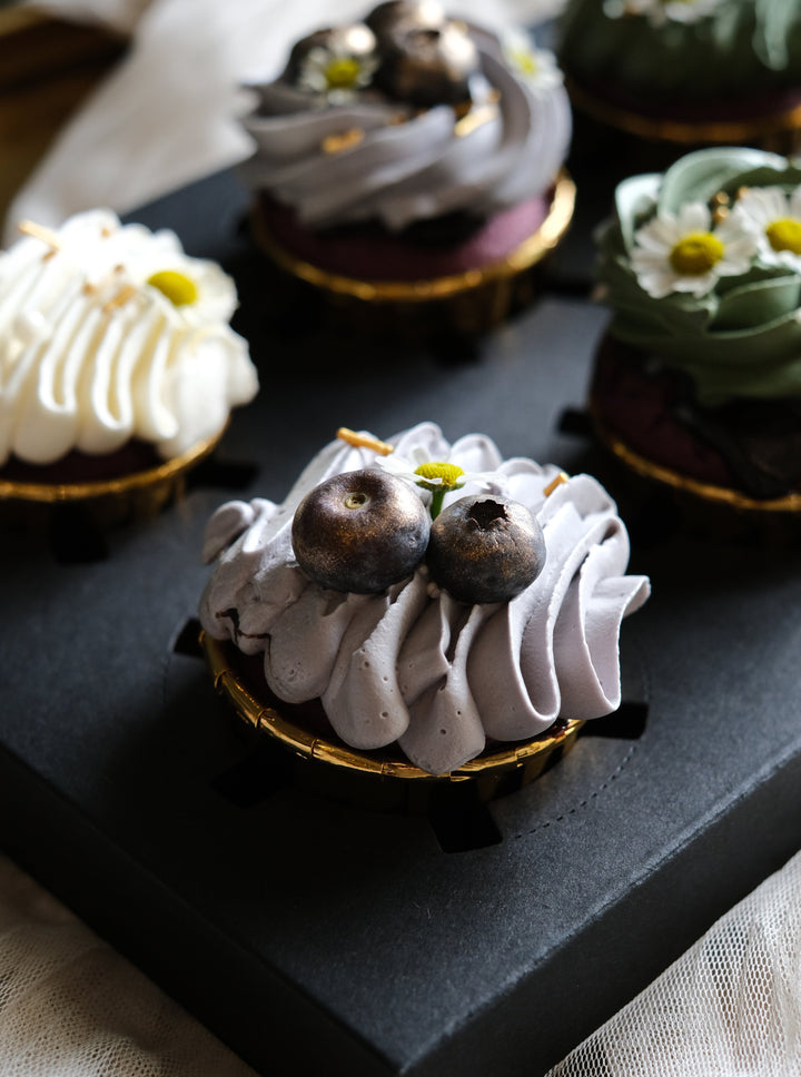 Berries velvet cupcakes, beautifully swirled with artisan fresh creams, garnished with gold dusted blueberries and fresh chamomile. Penang Cake Delivery, Penang Cake Delivery.  NOTE:  Strictly 3 days order in advance, deliveries limited to Island & Mainland Penang, Sungai Petani, Nibong Tebal, Jawi & Kulim.   For urgent orders kindly contact customer care for further assistance.