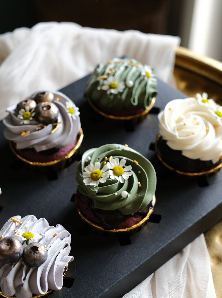 Berries velvet cupcakes, beautifully swirled with artisan fresh creams, garnished with gold dusted blueberries and fresh chamomile. Penang Cake Delivery, Penang Cake Delivery.  NOTE:  Strictly 3 days order in advance, deliveries limited to Island & Mainland Penang, Sungai Petani, Nibong Tebal, Jawi & Kulim.   For urgent orders kindly contact customer care for further assistance.