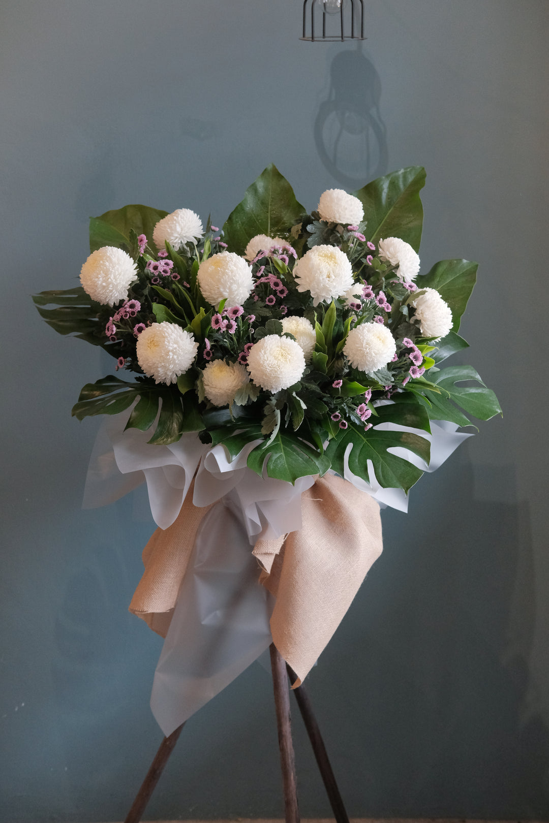 Featuring the freshest flowers to honour the deceased and shine to lift spirits up. For same day condolences flowers delivery in Penang.