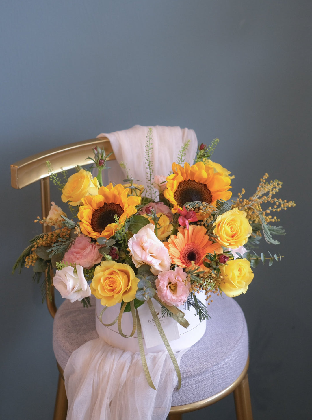 Electrifying zesty hues and a vibrant summer love of colors, featuring fresh seasonal flowers. Perfect for birthdays, anniversaries, and celebrations.