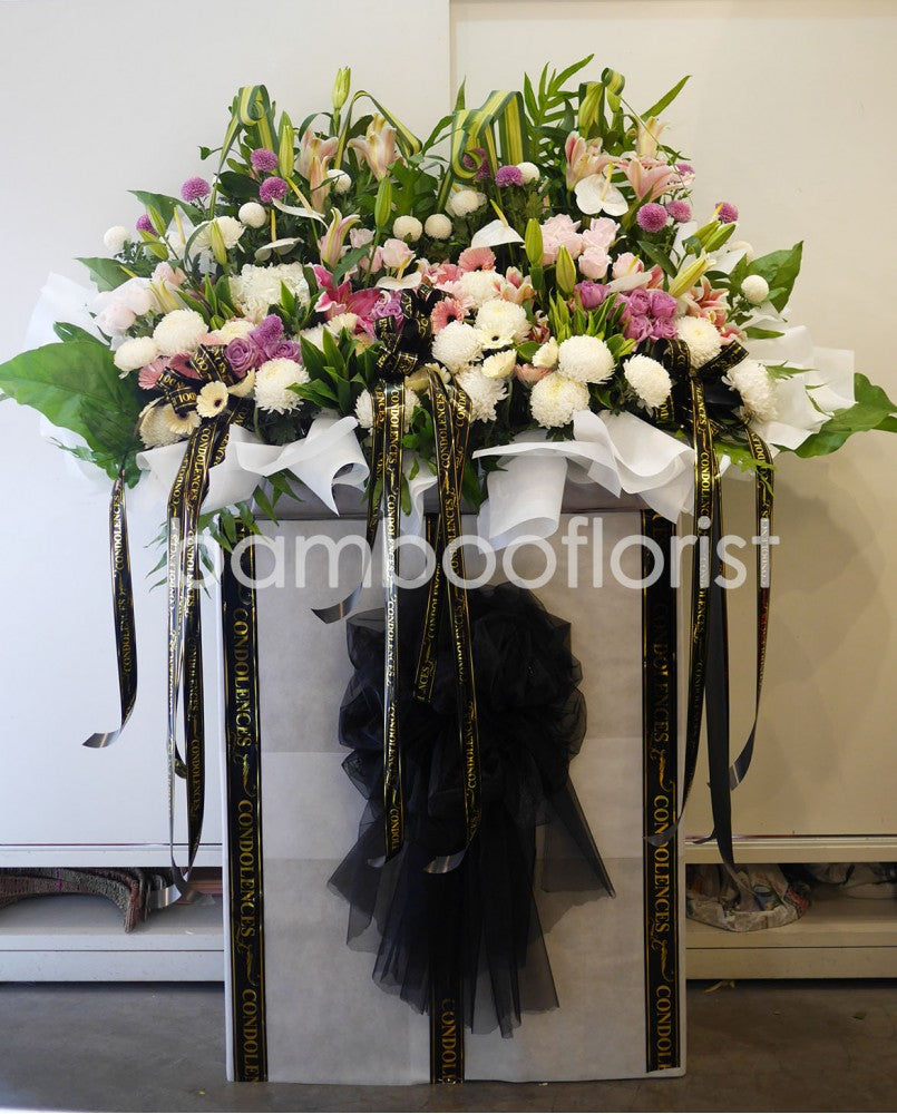 This lovely floral testament to the circle of life and love evokes beautiful memories even during the most difficult times. For same day condolences flowers delivery in Penang.