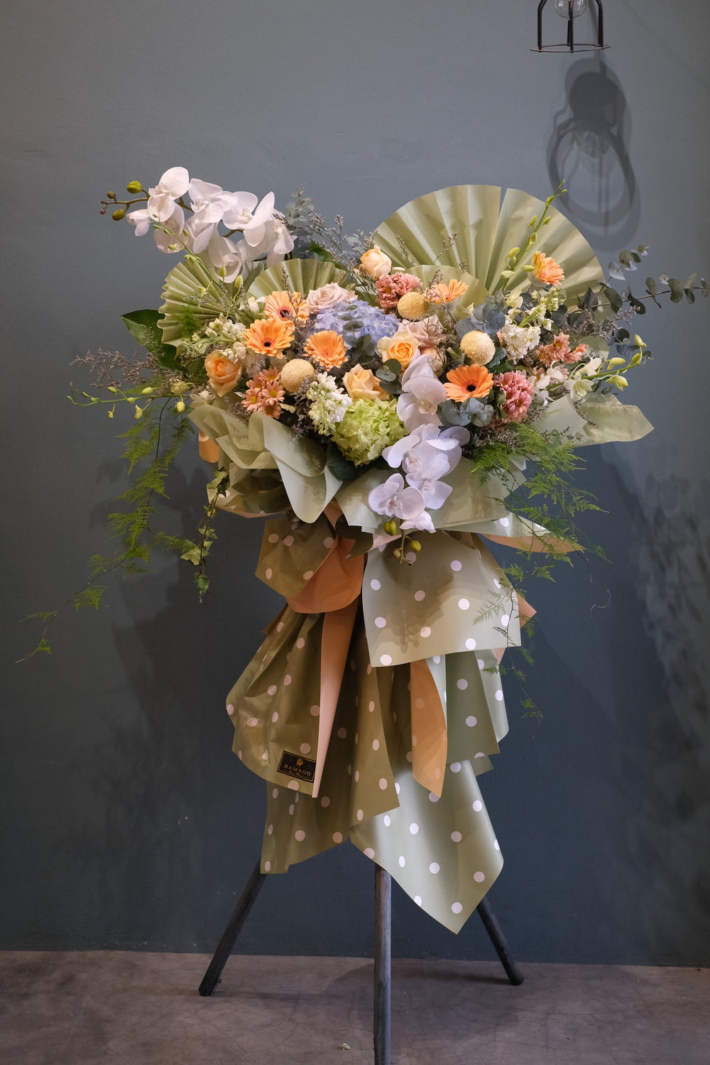 We love using seasonal blooms for most of our styling. Hence, if a flower pictured is unavailable for any reason, we reserve the right to substitute this for a flower of the same or higher monetary value in a similar style and color. Be rest assured that our stylists will ensure that the look and feel of the styling will not be compromised. For same day grand opening congratulations flowers delivery in Penang and Butterworth.