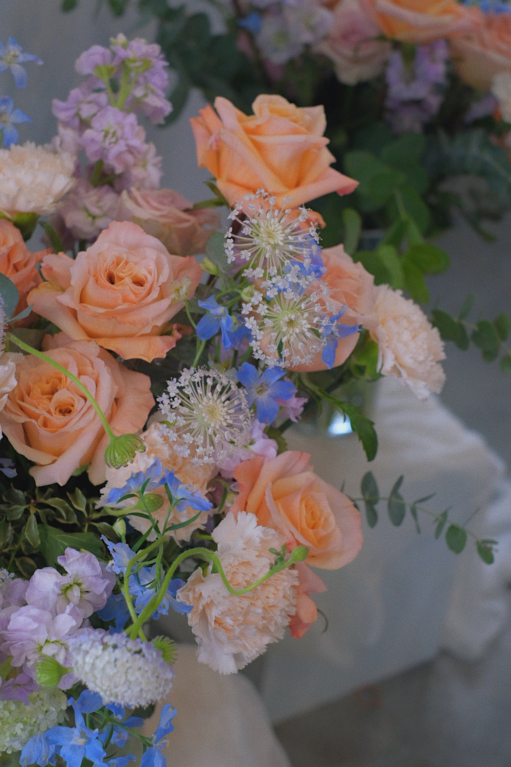 Elegantly arranged in a glass vase, this bouquet features soft, elegant blooms perfect for housewarmings, birthdays, baby showers, or engagements. Same-day delivery by Penang Florist.