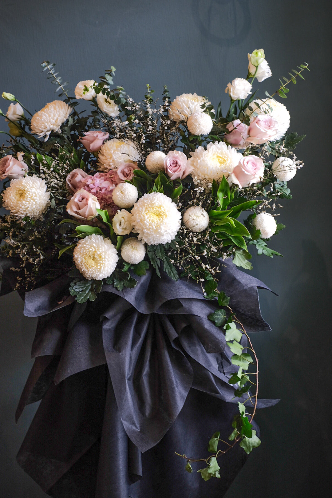 This lovely floral testament to the circle of life and love evokes beautiful memories even during the most difficult times. For same day condolences flowers delivery in Penang.