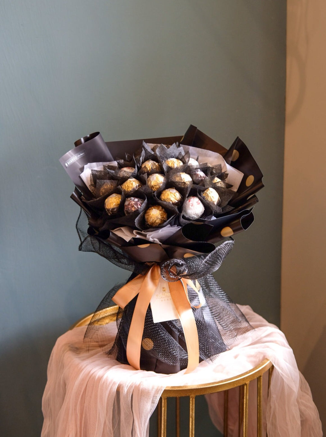 Delight in 24 pieces of Ferrero Rochers with Bamboo Green Florist's sweet perfection note. Order online for same-day delivery from your trusted Penang florist.
