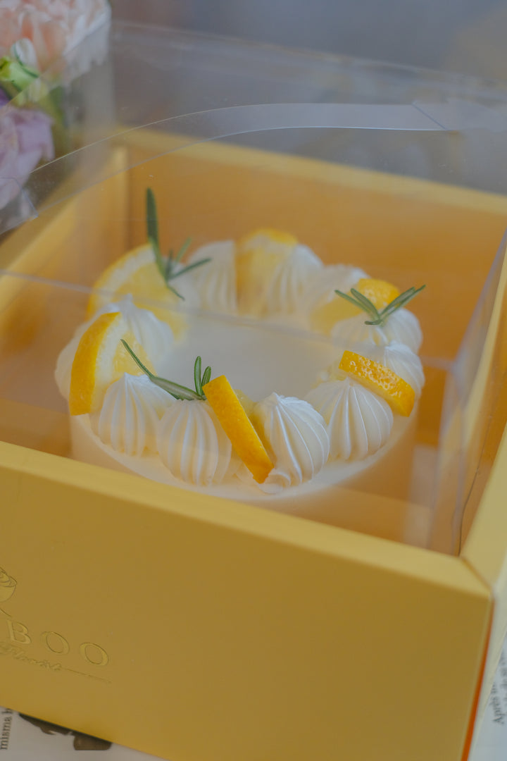 Mini 4-inch Lemon Cream Cheese Cake with Mum's favorite flowers – a perfect gift set for a proud, loving mom. Order from Bamboo Green Florist in Penang!