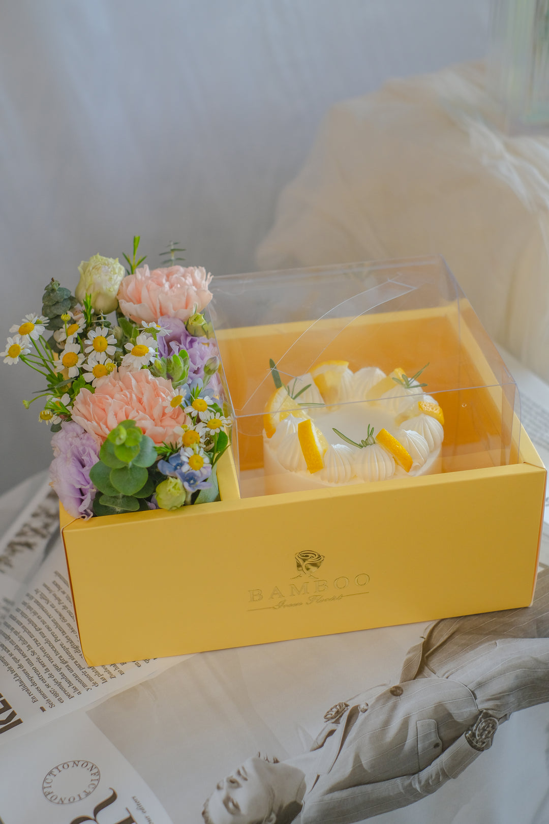 Mini 4-inch Lemon Cream Cheese Cake with Mum's favorite flowers – a perfect gift set for a proud, loving mom. Order from Bamboo Green Florist in Penang!