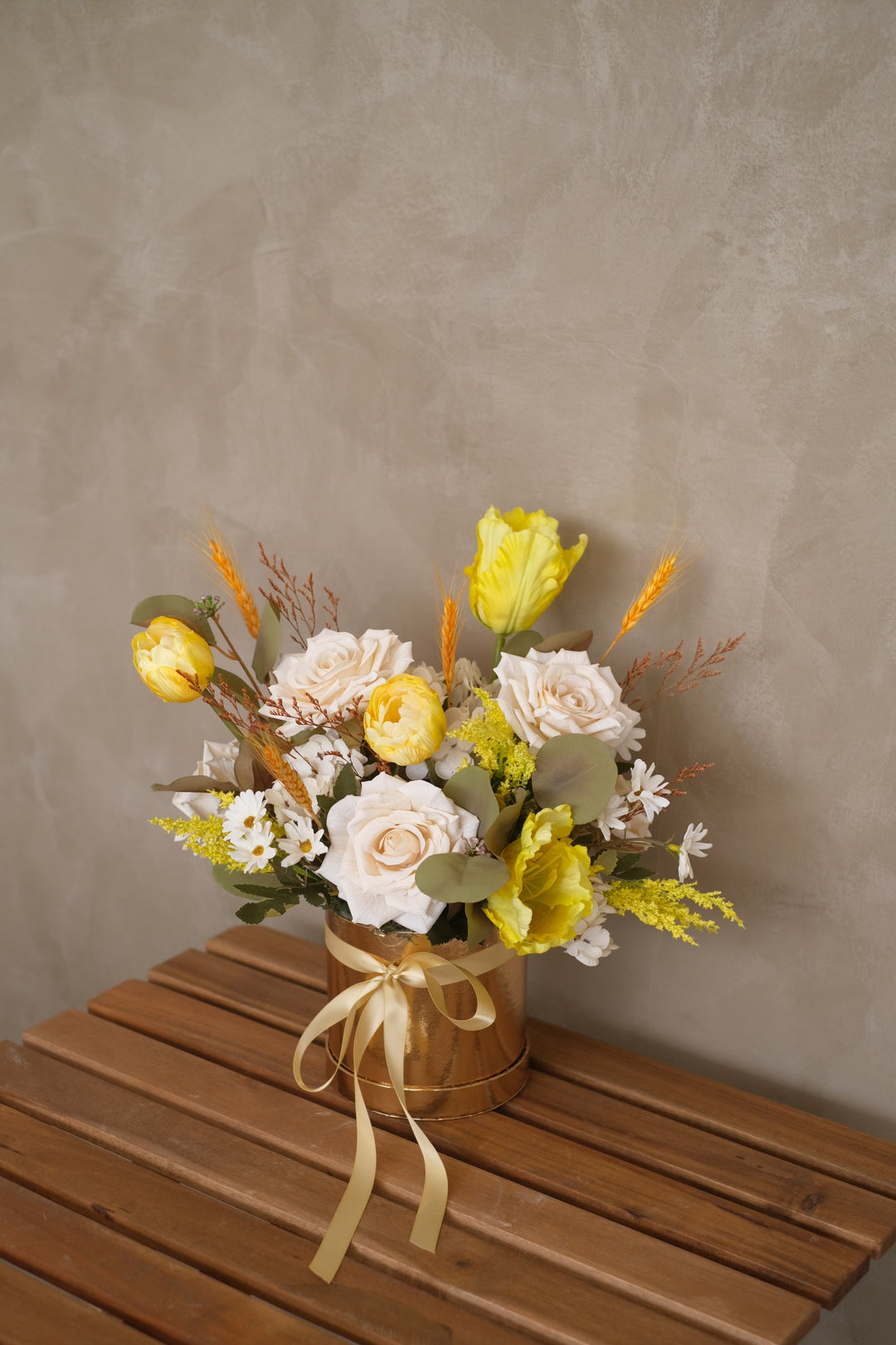 Fullerton, an exquisite collection of artificial flowers designed to bring the warmth of a vibrant sunset into your space.