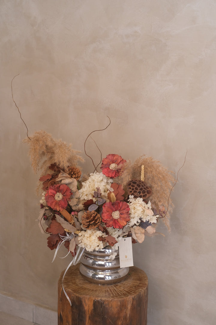 Bring the beauty of nature into your home with our Wood &amp; Pine. As you stroll through this dried flower kingdom, you will be in awe of the texture and variety of these eco-friendly flowers. We have used a mix of preserved stems to illuminate your home or space.