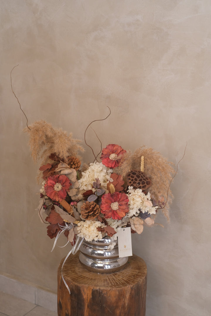 Bring the beauty of nature into your home with our Wood &amp; Pine. As you stroll through this dried flower kingdom, you will be in awe of the texture and variety of these eco-friendly flowers. We have used a mix of preserved stems to illuminate your home or space.