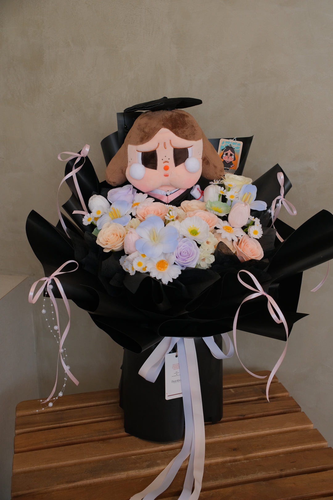 CRYBABY Sunset Concert Series Plush Bouquet with soap flowers in black wrap by Bamboo Green Florist Penang | Graduation gift bouquet Penang online florist