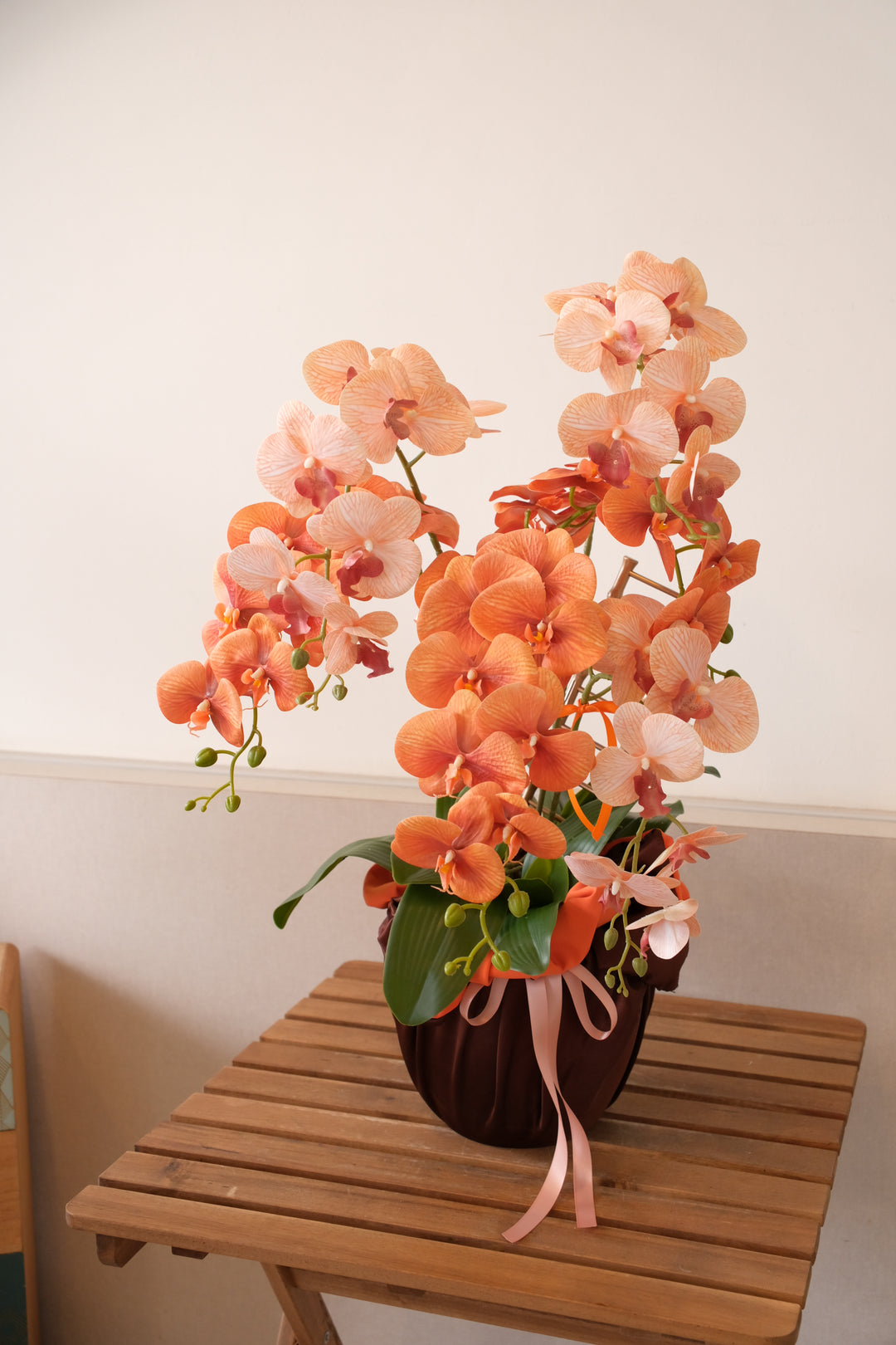 Artificial two-tone orchid arrangement with gold ladder accent