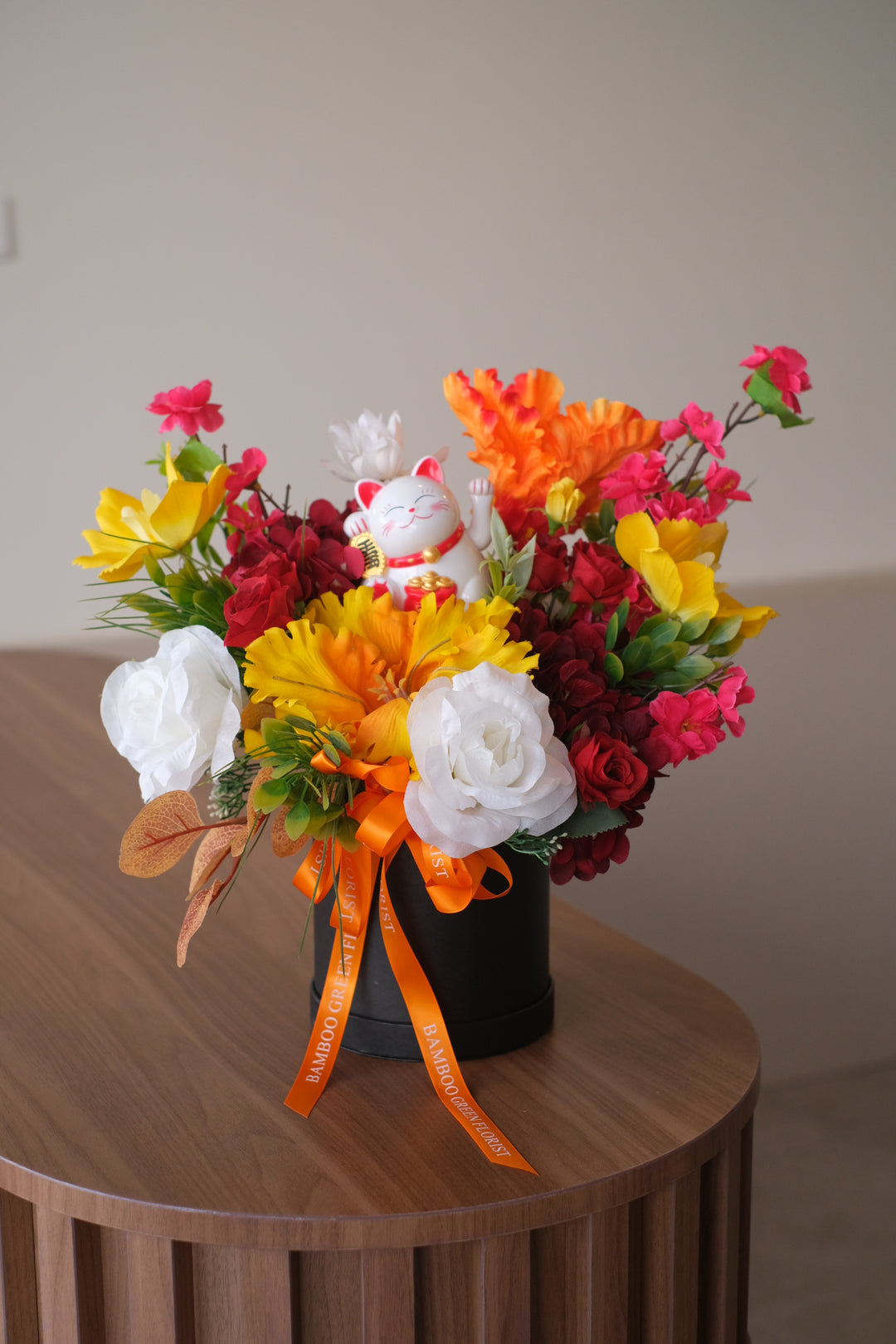 Fullerton, an exquisite collection of artificial flowers designed to bring the warmth of a vibrant sunset into your space.