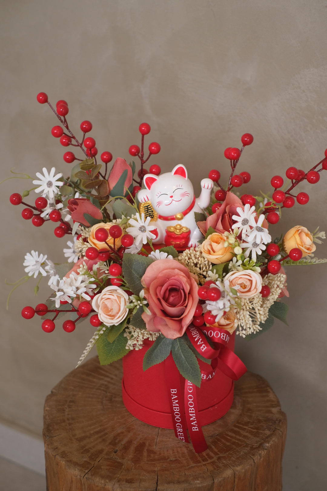 Enhance the new business space with this artificial arrangement, with a lucky cat charm nestled in between