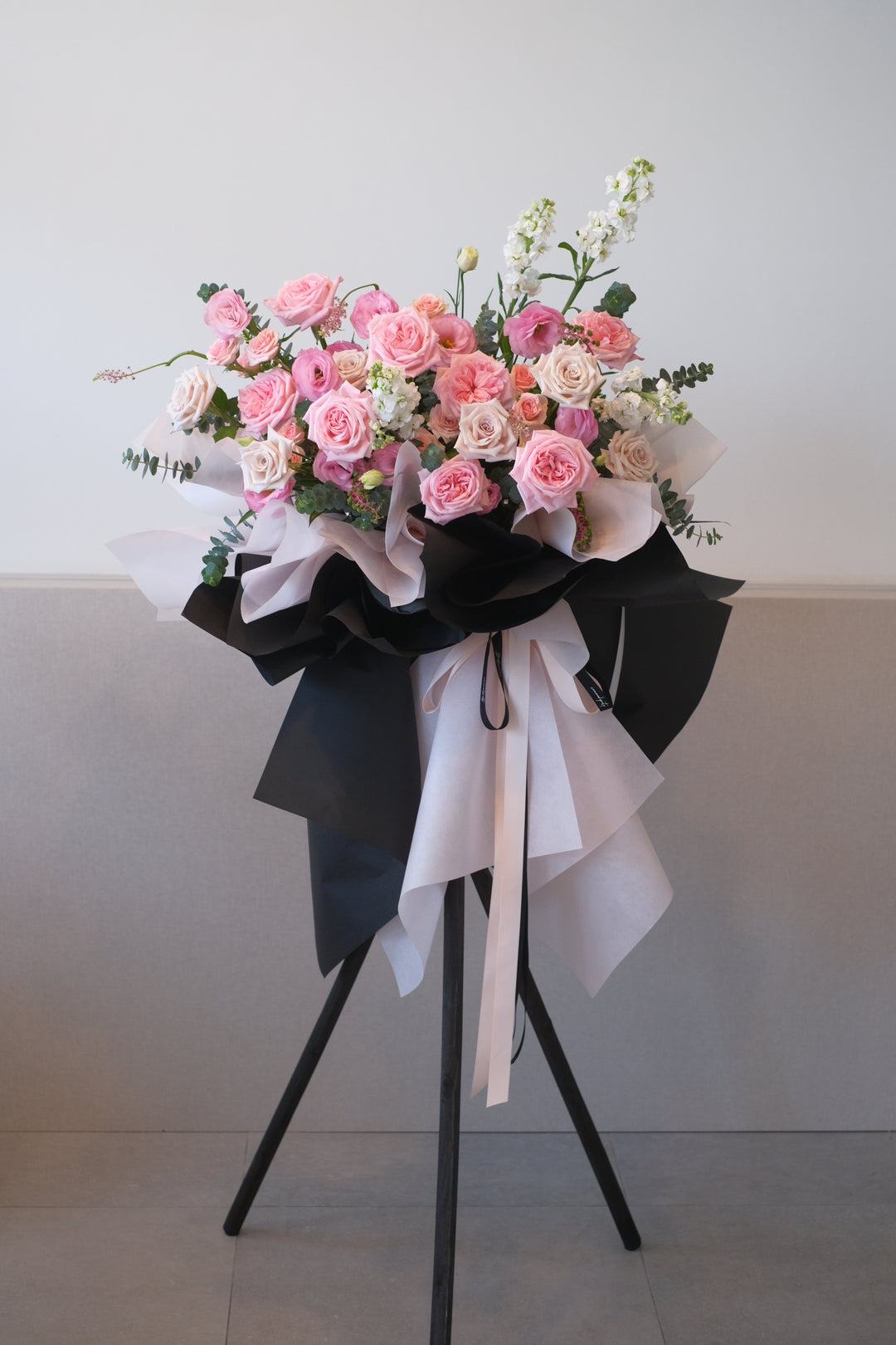 Celebrate your grand opening in style and distinction. Make a statement, create memories, and open the door to your new adventures with our exquisite black pink fresh floral arrangements. Your success story begins here." 🌸🖤🎉  Same day delivery in penang