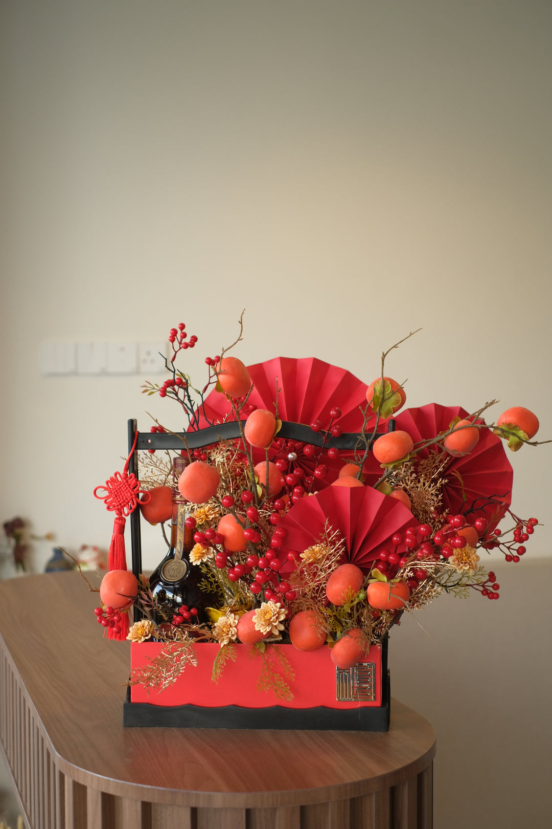 chinese new year with artificial flowers and martell vsop in box