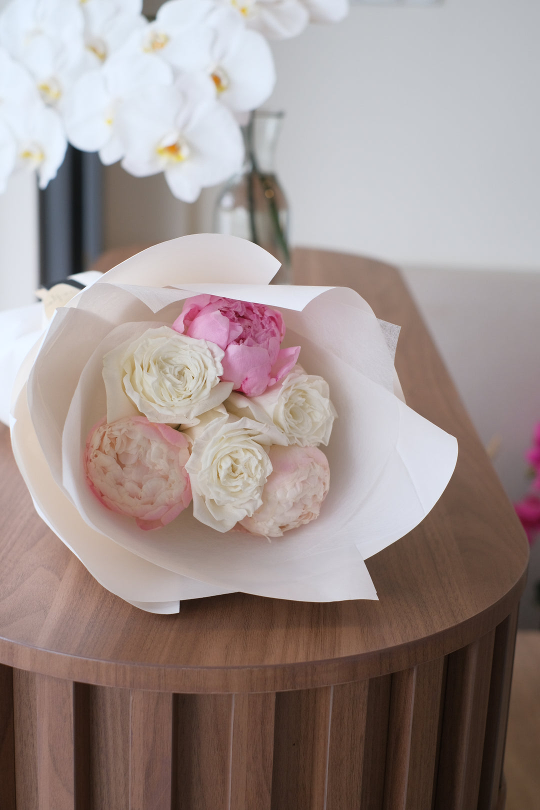 roses in white at floral shop, peonies in pink via florist online, white wrapping with same day delivery flower
