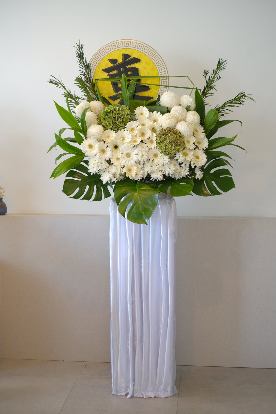A sympathy fresh flowers arrangement for same day delivery in penang island