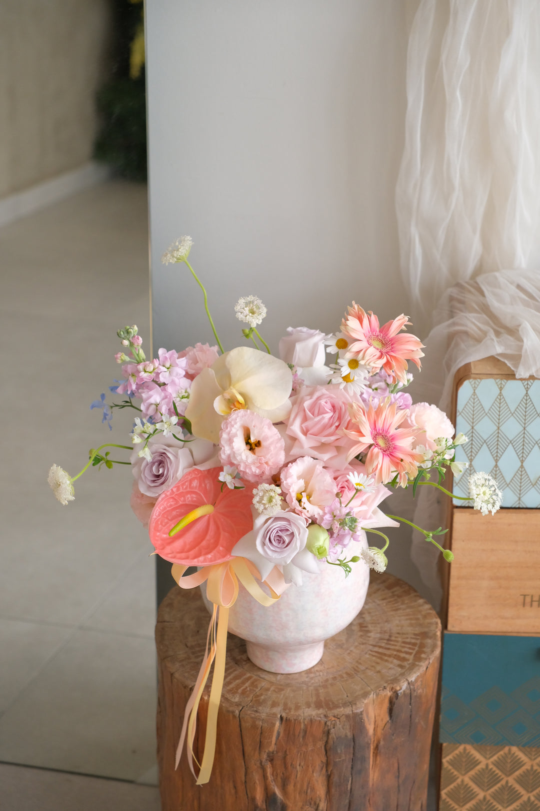 Sherbet Sky Omakase vase arrangement — peach gerbera, blush roses and lilac stock in a blush ceramic pedestal urn with peach ribbon, Bamboo Green Florist Penang
