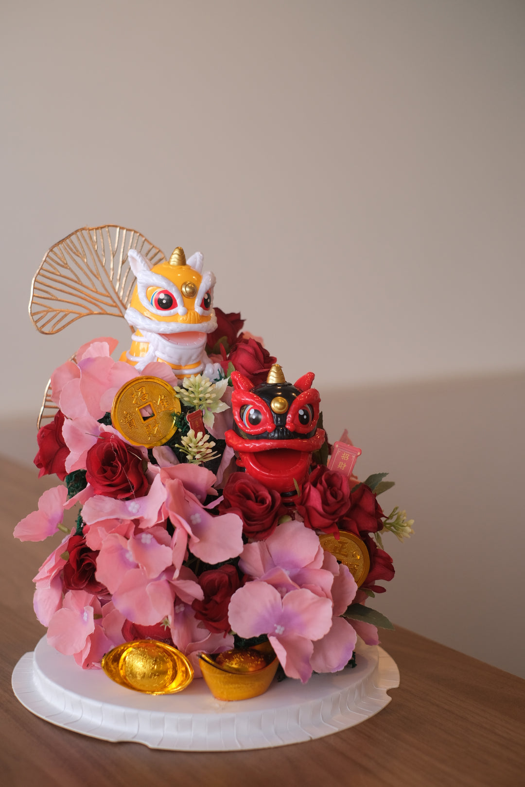 Lion Dance design with high-quality artificial flowers, symbolizing courage, strength, and good fortune. Perfect for new ventures. Penang florist, order online, same-day delivery.